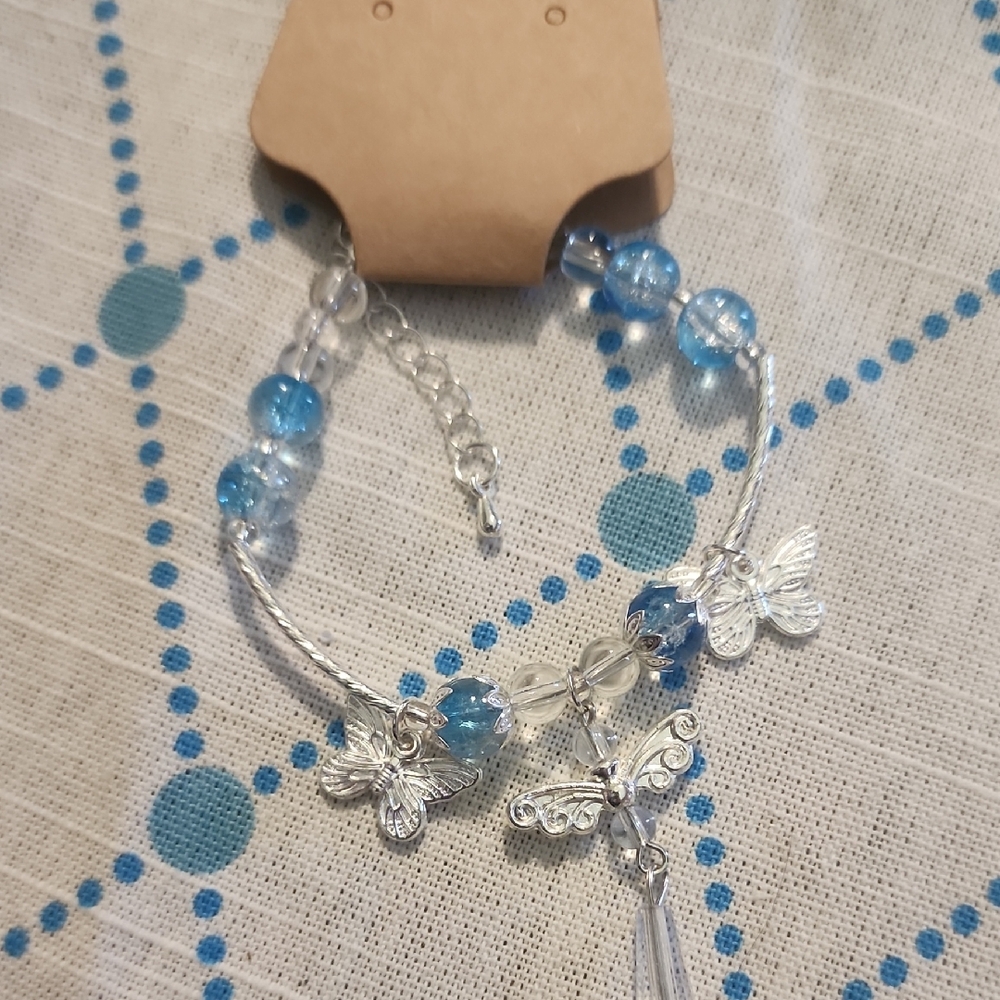 Silver Butterfly Charm Bracelet with Light Blue Beads